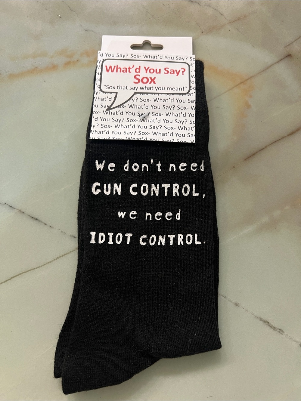 Black Novelty Socks - 'We Don't Need Gun Control'